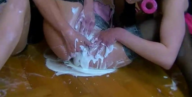 Gooey liquid featured heavily in an all-girl orgy video