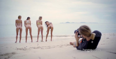 Four beach-dwelling nymphomaniacs showing their nude bodies