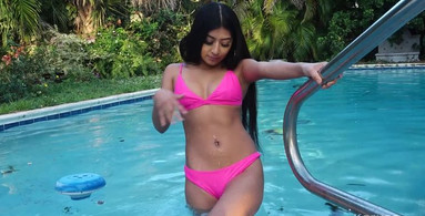 Poolside tease from the tight-bodied stunner Binky Baez