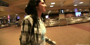 Filming her from the airport to the grocery store