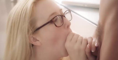 Cute blonde Sammy wears glasses while giving a BJ