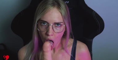Beautiful bitch in glasses sucking dildo