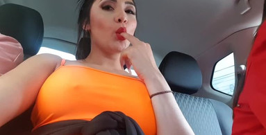 Naughty tease in the car with people around