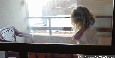 She gives me a blowjob on the balcony in front of the neighbors