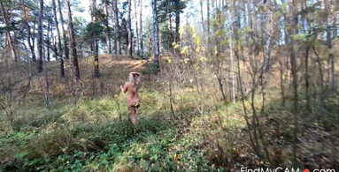 Naked Girl Walking in the autumn forest