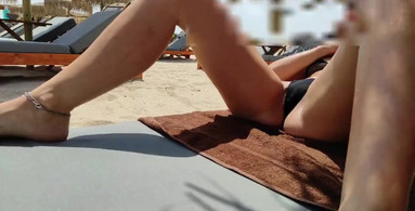 Amateur hot milf smoking and flashing pussy public at the beach