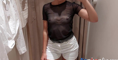 Sexy cutie takes a video of herself in the fitting room of the store
