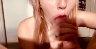 Cum dripping from her beautiful red lips